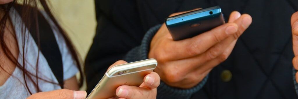 smartphone-mobile-hand-person-people-technology Social Media effect your business